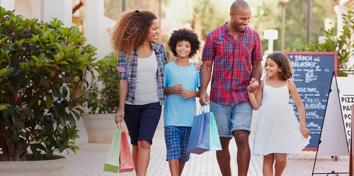 happy family out shopping